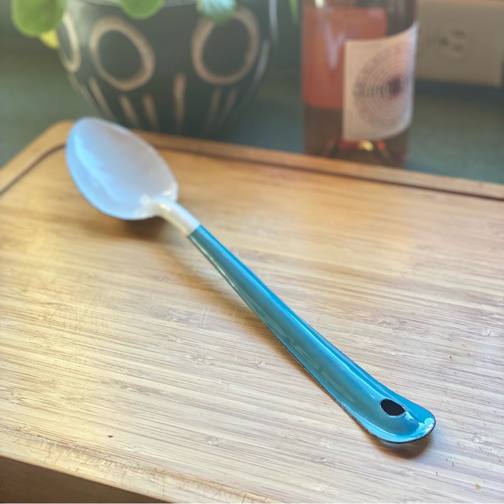 Vintage enamel serving spoon